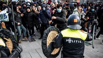 Police and protesters in Eindhoven