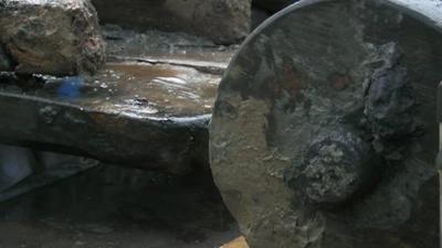 Close up of wheel of 350-year-old gun carriage recovered from a wreck in the Thames Estuary