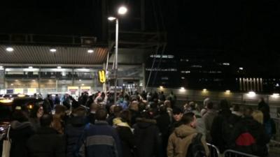 Queuing commuters at East Croydon