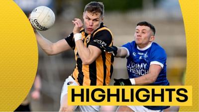 Crossmaglen's Oisin O'Neill in action against Michael McConville