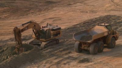 mining digger and lorry