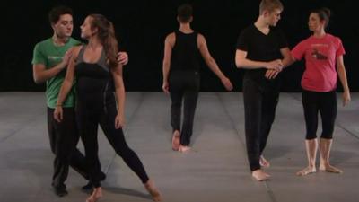 Dancers practising in a studio