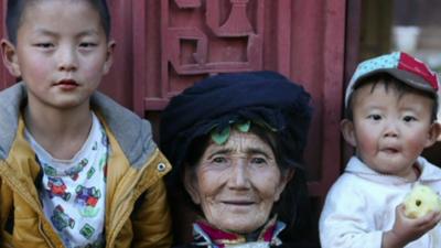 Grandmother and children