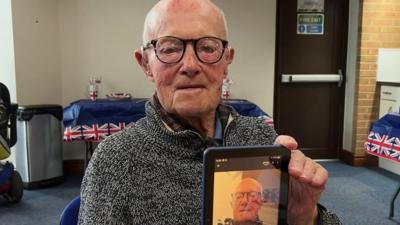 A 100-year-old man takes a selfie