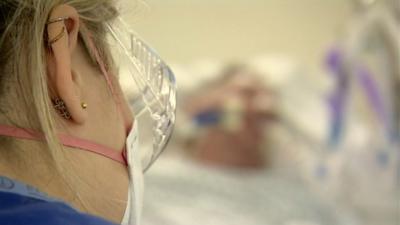 A nurse and patient on the ITU ward in Coventry