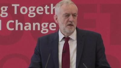 Cuts to local authority funding are responsible for problems in the social care system, the Labour leader says.