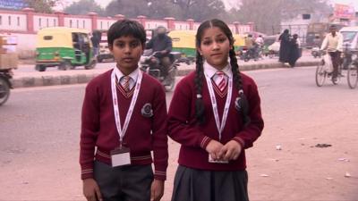 Children from Delhi front a report for BBC School Report.