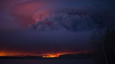 Pyrocumulus clouds near Anzac, a hamlet 48 km southwest of Fort McMurray, Alberta, Canada