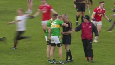 Glen players protest to referee John Joe Cleary after the final whistle