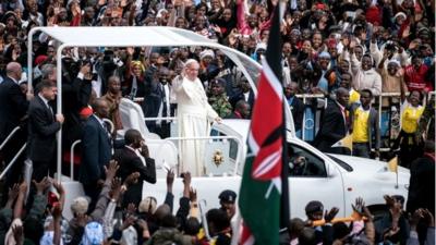 Pope Francis arrives at the University of Nairobi for a public mass in downtown Nairobi