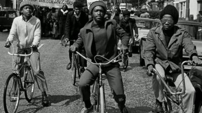 Men on bicycles