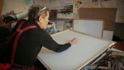 Osi Rhys Osmond creating a painting