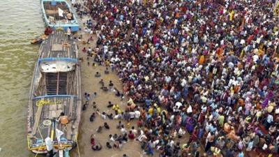 Pilgrims at riverside in India