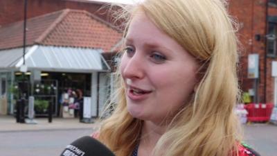 Woman singing in centre of Lincoln