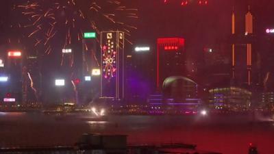 Hong Kong skyline lit up by fireworks - 1 July 2017