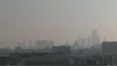 Photo of a haze of pollution sitting over east London