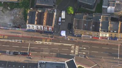 Aerial footage as police teams work at the scene of an attack outside a mosque in north London.