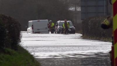 Van stuck in flood water