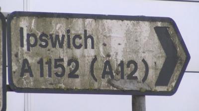 Dirty road sign in Suffolk