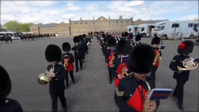 Soldiers rehearse Trooping the Colour