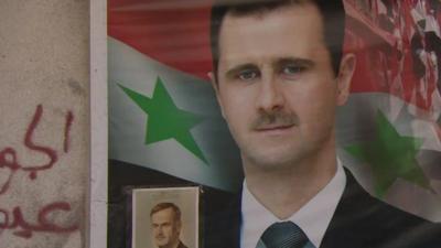 Poster on a wall in Syrian showing Bashar al-Assad