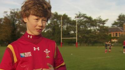 Boy in Wales rugby shirt