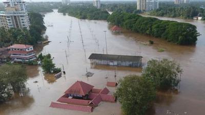 Flooded roads and rivers in Kerala, India.