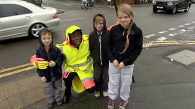 Keith Bennett with some of the children on his route