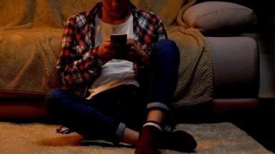 Boy sitting on the floor