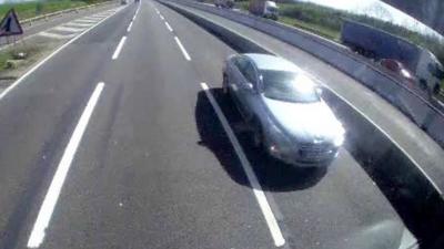 Car being driven down wrong way on M1