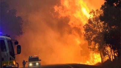 A handout image provided by the Department of Fire and Emergency Services on 09 January 2016 of a bushfire at Yarloop, 120 km south of Perth, Australia.