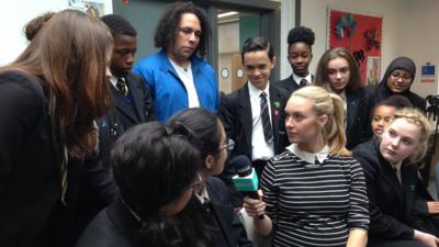 School kids discuss the issue of racism with anti-bullying campaigner Alex Holmes