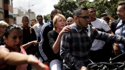 Luisa Ortega leaves the public prosecutor's office by motorcycle