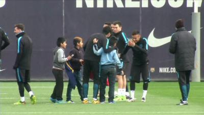 Kids sneak into Barcelona training