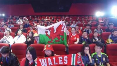 Chinese fans greet Welsh players in Nanning