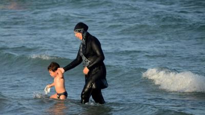 A woman in a burkini