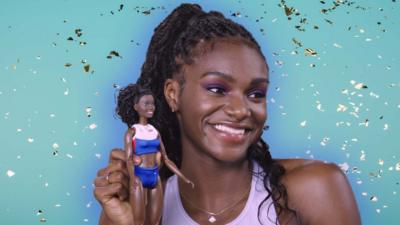 dina-asher-smith-with a-barbie-doll-that-was-made-for-her