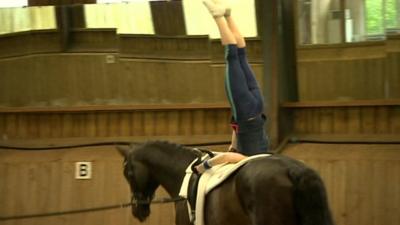 Lucy Phillips demonstrating the sport of vaulting