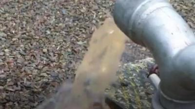 Brown water coming from a tap