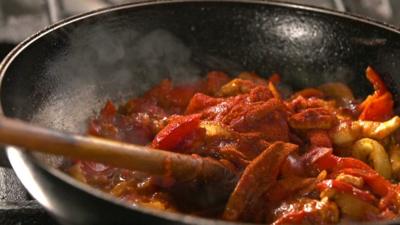 A spicy dish in a frying pan