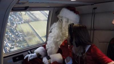 Santa in a helicopter