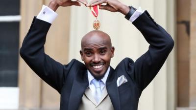 Sir Mo Farah with medal