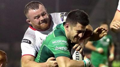 Andrew Warwick tackles Tiernan O'Halloran