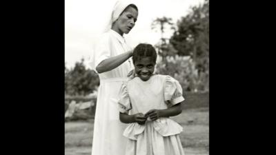 Nun and child at Catholic orphanage, Bailundo, Angola, 2008