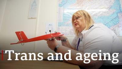 Cat Burton and a model plane