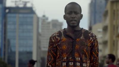 Journalist wearing kitenge