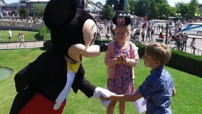 Fred meets Mickey Mouse