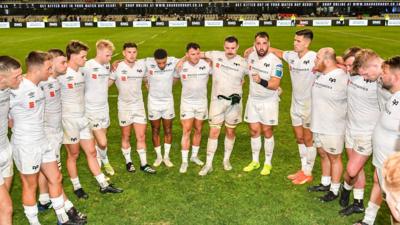 Ospreys huddle following their United Rugby Championship match against Sharks.