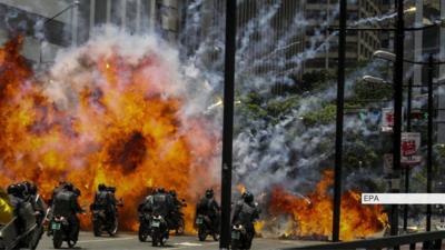 Police on motorbikes are targeted by an explosion