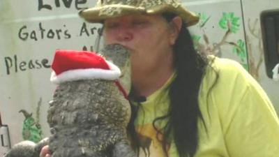 Mary Thorn kisses alligator